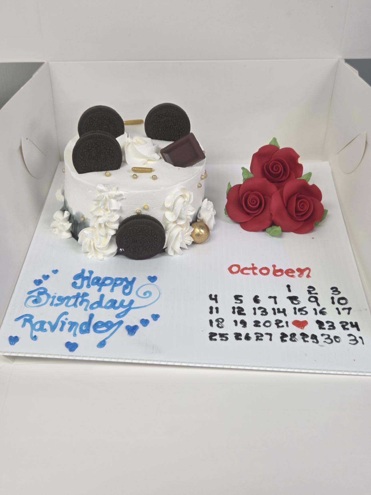 Another view of the custom Oreo birthday cake with roses and calendar – Manohar Bakery Kelowna